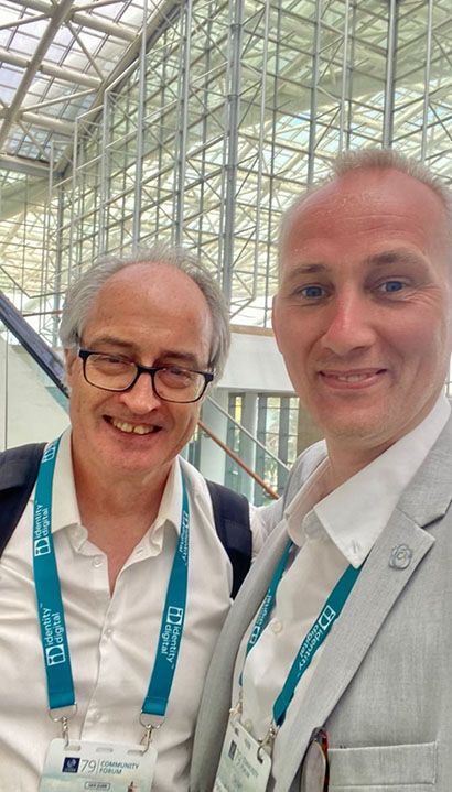 Phil Buckingham (left) with Helmuts Meškonis (right) attending ICANN79